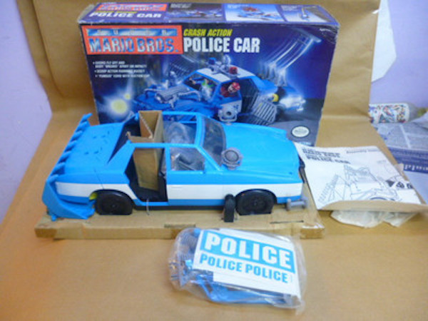 Released in 1993 by Ertl, the Movie Crash Action Police Car out of box
