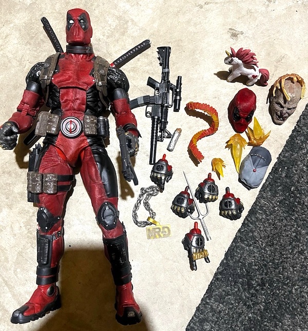 Marvel 1/4 Scale Ultimate Deadpool out of the box. Click to value or sell yours