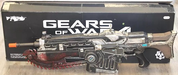 NECA Gears of War Life Size Lancer Replica out of the box. Click for values