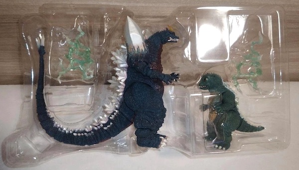 S.H. MonsterArts Space Godzilla & Little Godzilla Special Color Edition open box. Click to value or sell one
