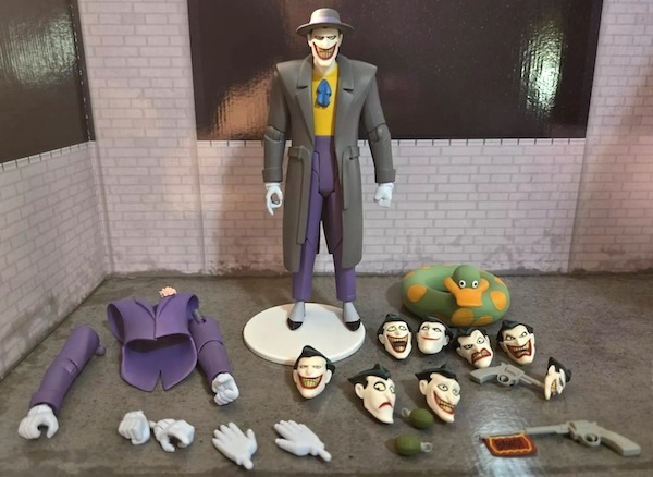 Batman the Animated Series Joker Expressions Pack Figure Set out of the box. Click for a free valuation