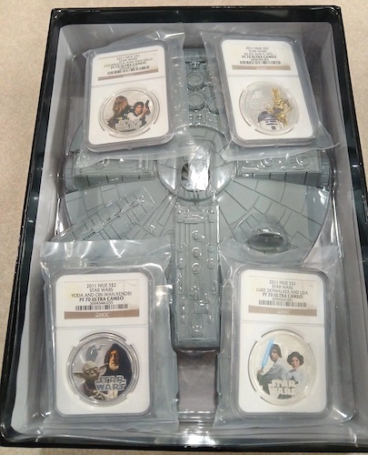 Star Wars Millennium Falcon Silver Coin Set open box. Click to value or sell yours