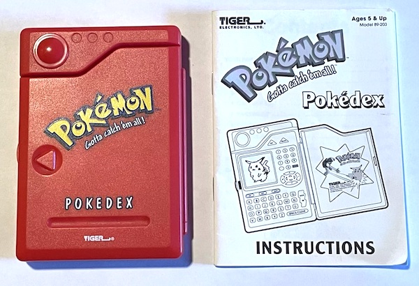 Pokemon Pokedex out of the pack. Click for appraisal