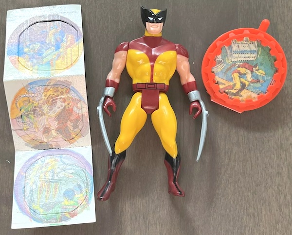 Marvel Secret Wars Wolverine Figure out of the pack. Click to value or sell one