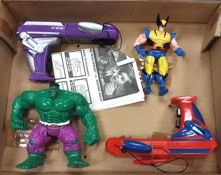 X-Men Heavy Hitters Raging Hulk vs Slashing Wolverine Action Figure Set open box. Click for values
