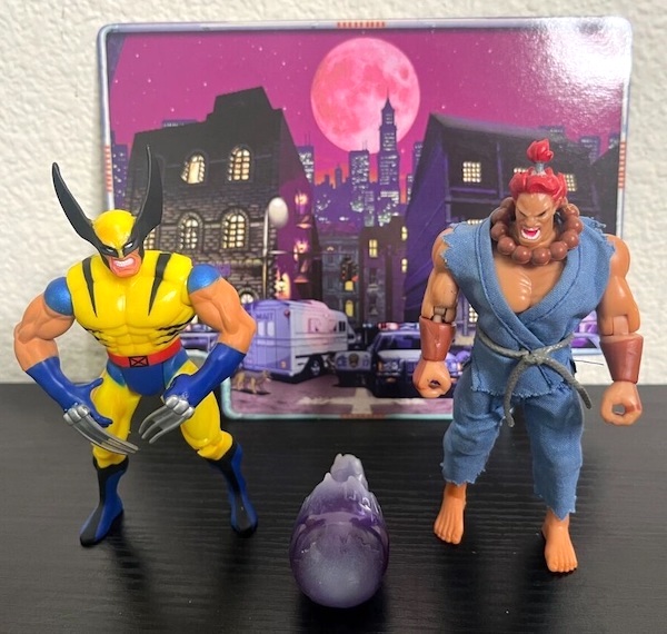 X-Men Wolverine Vs Street Fighter Akuma Action Figure Set out of the pack. Click to appraise yours